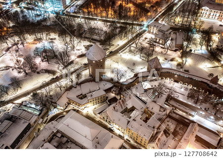 Aerial night View of Tallinn in winter, roofs are covered with snow, Christmas mood 127708642