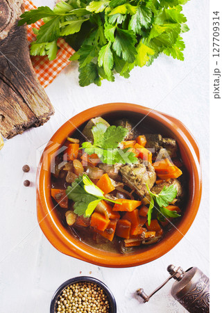 Fried chicken liver with onions and carrots Fried chicken liver with onions and carrots 127709314