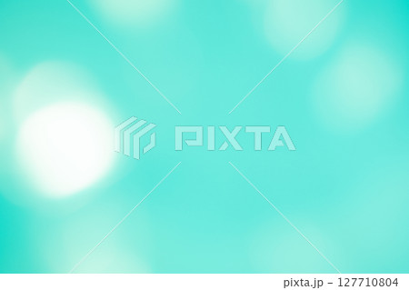 エメラルドグリーン系キラキラ背景素材　(写真素材) 127710804