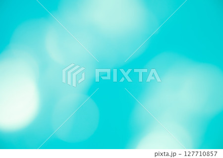 エメラルドグリーン系キラキラ背景素材　(写真素材) 127710857