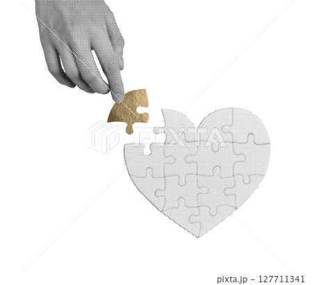 Golden puzzle piece fitting perfectly into a heart, symbolizing love, connection, and healing. 127711341