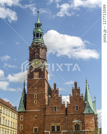Historic Townhouse with Clock Under Clear Blue Sky, Wroclaw, Poland Historic Townhouse with Clock Under Clear Blue Sky, Wroclaw, Poland 127713099