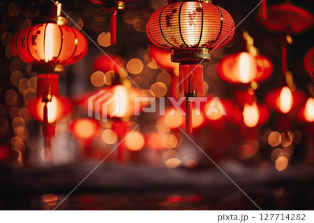 Radiant Reverie Red Lantern Illuminates the Night, Creating a Captivating Chinese New Year Festival Background Perfect for Heartfelt Greeting Cards. created with Generative AI 127714282