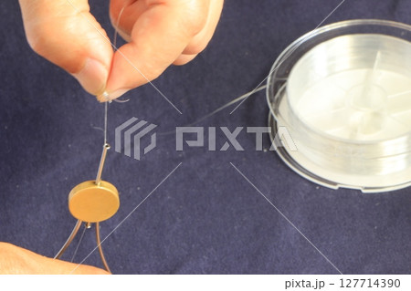 釣りの仕掛けの巻き付け 釣りの仕掛けの巻き付け 127714390