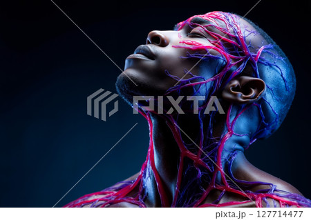 A man with a red and blue body painted like a human body 127714477