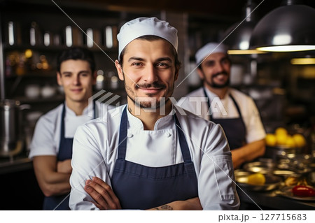 Culinary Harmony Chef and Team Stand United in a Commercial Kitchen at the Restaurant, Crafting Culinary Excellence in Perfect Synchrony. created with Generative AI Culinary Harmony Chef and Team Stand United in a Commercial Kitchen at the Restaurant, Crafting Culinary Excellence in Perfect Synchrony. created with Generative AI 127715683