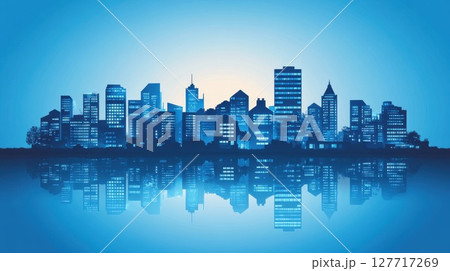 Urban skyline reflecting on calm water during twilight with blue hues illuminating the cityscape 127717269