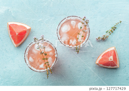 Salty Dog cocktail with fresh grapefruit juice, lime juice, and thyme Salty Dog cocktail with fresh grapefruit juice, lime juice, and thyme 127717429
