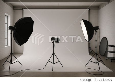 Photography studio setup with lighting equipment and backdrop for professional photoshoots. concept of studio lighting, professional equipment, indoor photography space. 127718805