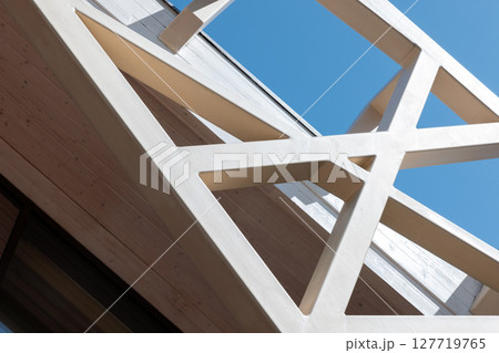 A striking composition featuring a geometric architectural design 127719765