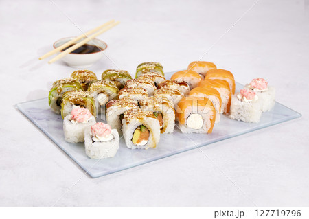 Assorted set of various sushi rolls with tuna, salmon, eel, avocado Assorted set of various sushi rolls with tuna, salmon, eel, avocado 127719796
