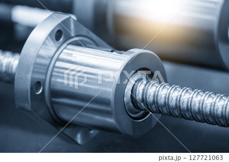 Closeup scene the group spare parts lead ball screw set in the light blue scene. Closeup scene the group spare parts lead ball screw set in the light blue scene. 127721063