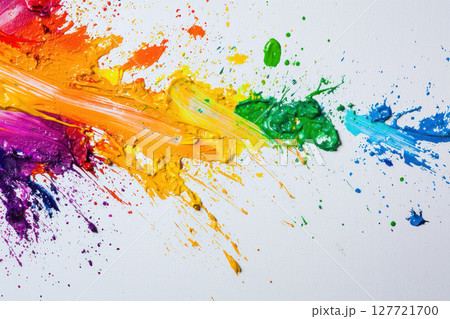 Rainbow paint splatters on canvas create joyful and vibrant scene, perfect for artistic expression 127721700