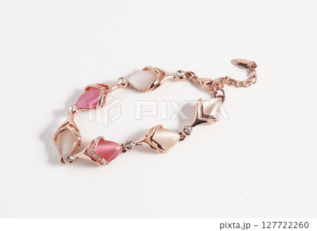 Beautiful bracelet with white and pink crystals caged in rose-colored plated metal alloy and rhinestones. Beautiful bracelet with white and pink crystals caged in rose-colored plated metal alloy and rhinestones. 127722260