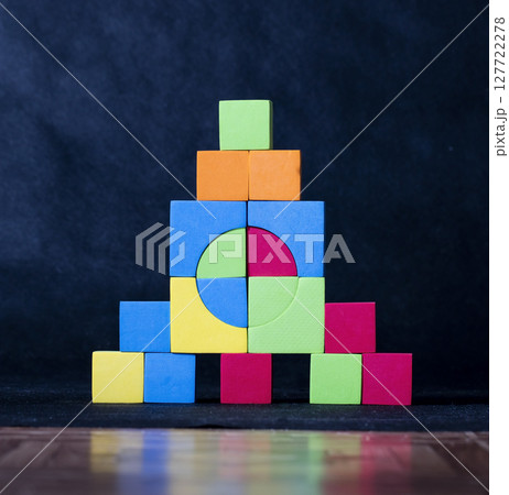 structure is built from children's blocks, toy, children's game structure is built from children's blocks, toy, children's game 127722278