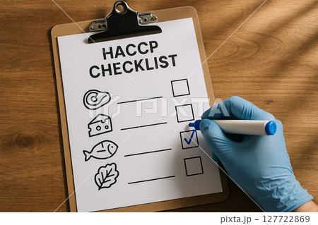 Food safety checklist based on HACCP system showing icons of meat, cheese, fish and vegetables marked by inspector wearing blue protective gloves 127722869