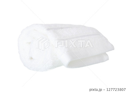 Rolled white face towel isolated on white Rolled white face towel isolated on white 127723807