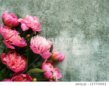 Bouquet of a lot of peonies of pink color close up. Flat lay, top view. Bouquet of a lot of peonies of pink color close up. Flat lay, top view. 127724081