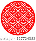 Traditional circular Japanese geometric pattern with red symmetrical arches and diamonds on a white background 127724382