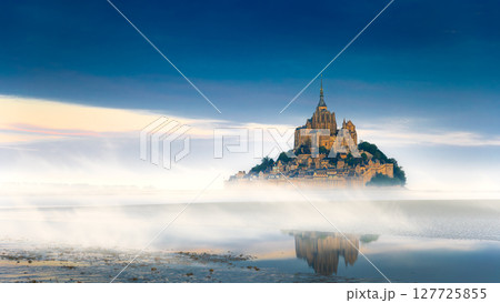Mont Saint-Michel view in the sunrise light. Normandy, northern France Mont Saint-Michel view in the sunrise light. Normandy, northern France 127725855