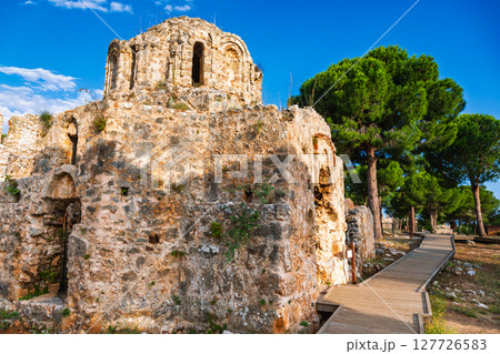Historic Byzantine church within Alanya Castle complex in warm sunset light 127726583