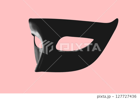 Black carnival mask on pink background 127727436