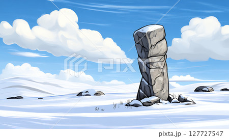 Snowy landscape with tall rock formation under blue sky 127727547