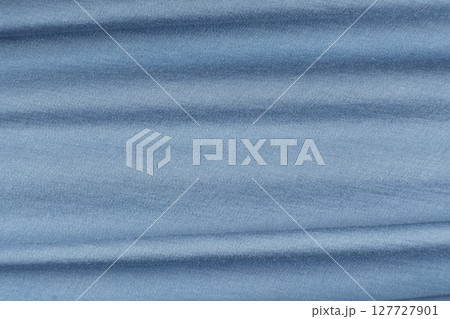 Smooth Blue Fabric Background with Artistic Abstract Design and Text Space Smooth Blue Fabric Background with Artistic Abstract Design and Text Space 127727901
