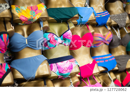 Mannequins women in bikinis many colours 127728062