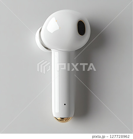 Close-Up of Stylish White Wireless Earbud with Gold Accents Close-Up of Stylish White Wireless Earbud with Gold Accents 127728962