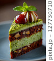 Dark Chocolate cake with cream and pistachio, dubai chocolate style 127730710