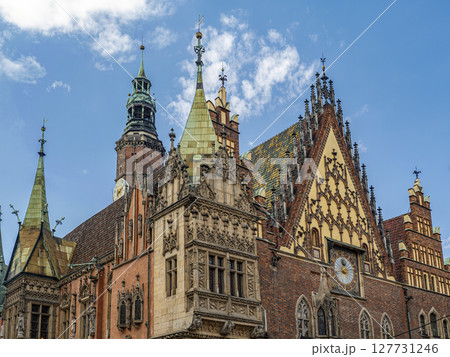 Gothic Architecture of Historic European Town Hall Building Against a Blue Sky, Wroclaw, Poland 127731246