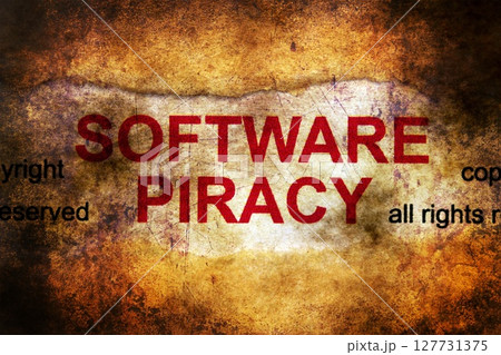 Software piracy grunge concept Software piracy grunge concept 127731375