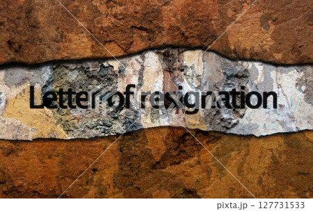 Letter of resignation text on wall Letter of resignation text on wall 127731533