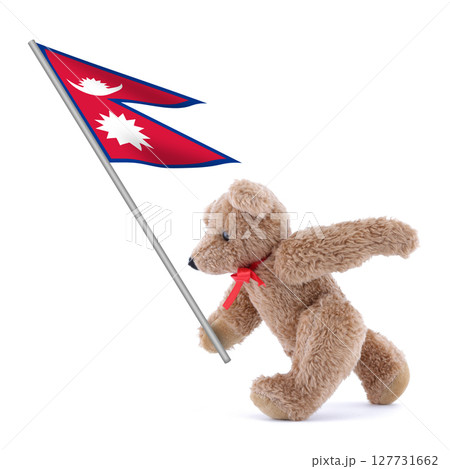 Nepal flag being carried by a cute teddy bear 127731662