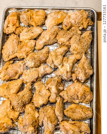 chicken wings appetizer on baking tray 127733161