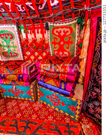 Interior decoration of the yurt. Living room with stove. traditional Uzbek yurt insideInterior decoration of the yurt. Living room with stove. traditional Uzbek yurt inside 127733351