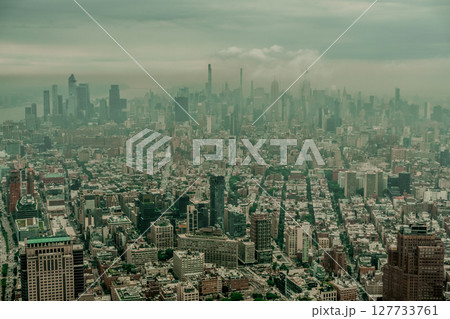 New York City Manhattan midtown aerial panorama view with skyscrapers and cloudy day. New York City Manhattan midtown aerial panorama view with skyscrapers and cloudy day. 127733761