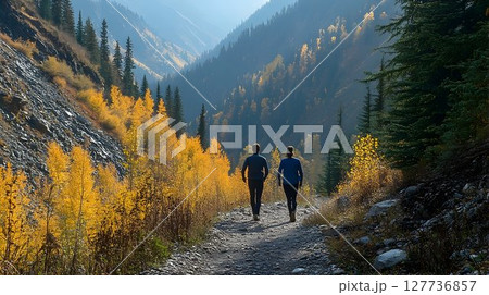 Autumnal Hike: Couple Strolling Through Golden Aspen Grove in Mo 127736857