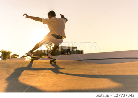 Surf skater training surfing moves 127737342