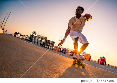 Surf skater training surfing moves Surf skater training surfing moves 127737360