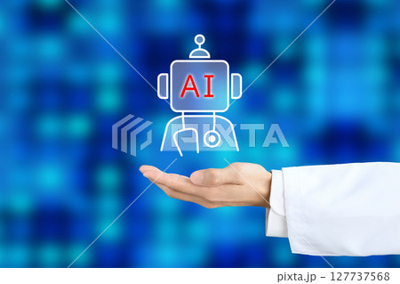 AIのドクターのアイコンを掲げる白衣を着た人物の手のイメージ画像 127737568