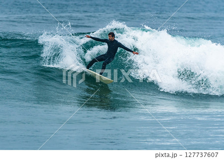 Surfing the waves 127737607