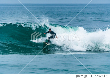 Surfing the waves 127737612