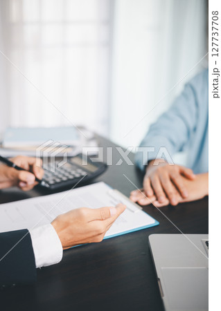 Business people signing contract making deal with life insurance agent Concept for consultant health insurance life insurance savings plan. Approved stamp with Business people contract making deal Business people signing contract making deal with life insurance agent Concept for consultant health insurance life insurance savings plan. Approved stamp with Business people contract making deal 127737708