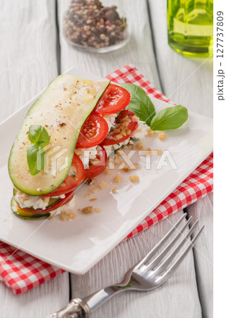 Italian appetizer of vegetables and cheese Italian appetizer of vegetables and cheese 127737809