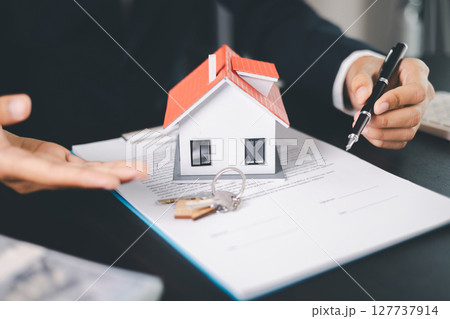 Concept business house finance protection office plan investment buy sell home ensuring idea financial security. residence agent hand protect purchase insurance and secure favorable loan deal. Concept business house finance protection office plan investment buy sell home ensuring idea financial security. residence agent hand protect purchase insurance and secure favorable loan deal. 127737914
