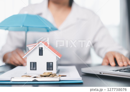 Concept business house finance protection office plan investment buy sell home ensuring idea financial security. residence agent hand protect purchase insurance and secure favorable loan deal. 127738076
