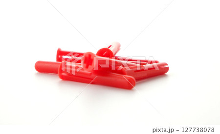 Red plastic dowels 127738078