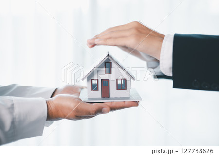Concept business house finance protection office plan investment buy sell home ensuring idea financial security. residence agent hand protect purchase insurance and secure favorable loan deal. Concept business house finance protection office plan investment buy sell home ensuring idea financial security. residence agent hand protect purchase insurance and secure favorable loan deal. 127738626